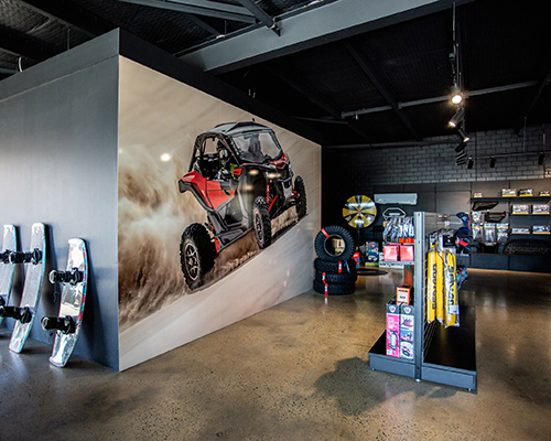 Wa seadoo interior showroom with off-road vehicle wall graphic