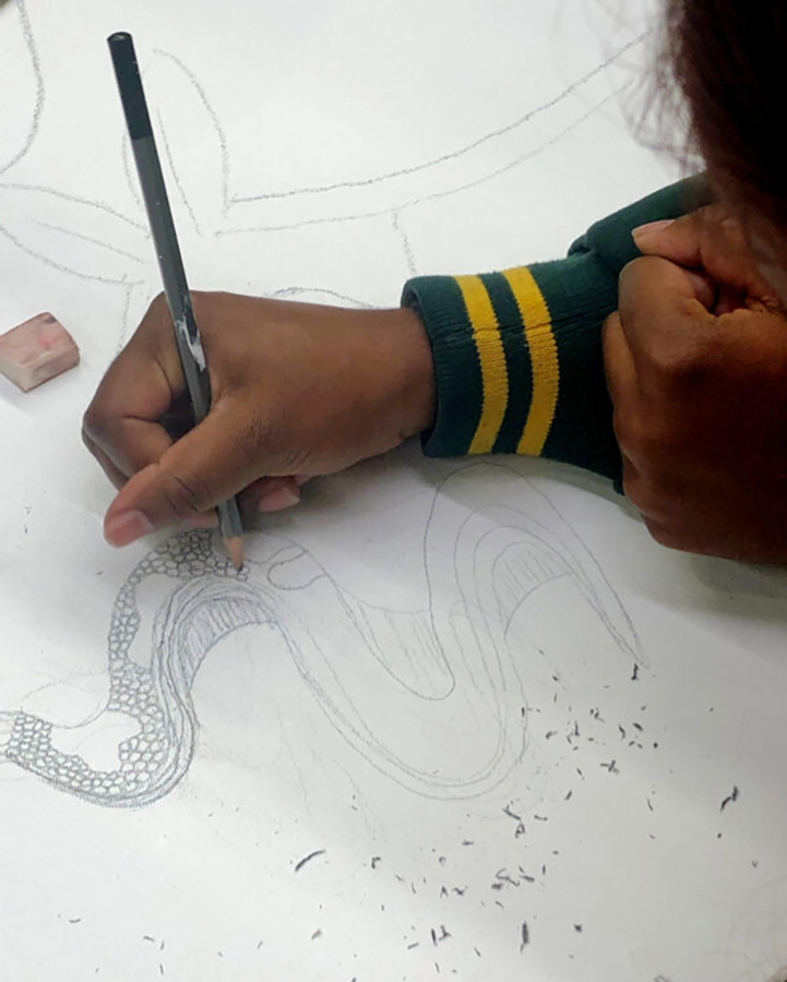 Close-up of young girl drawing