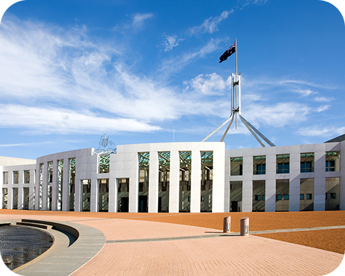 Australian parliament house with australian flag flying proudly above