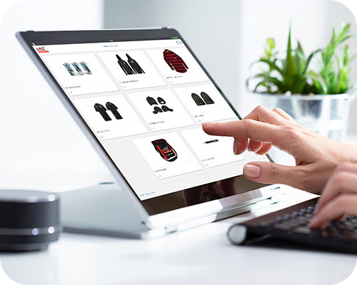 A person browsing an online store on a tablet, selecting clothing items