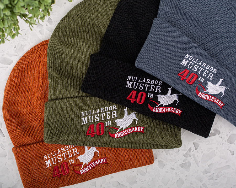 A stack of colourful beanies