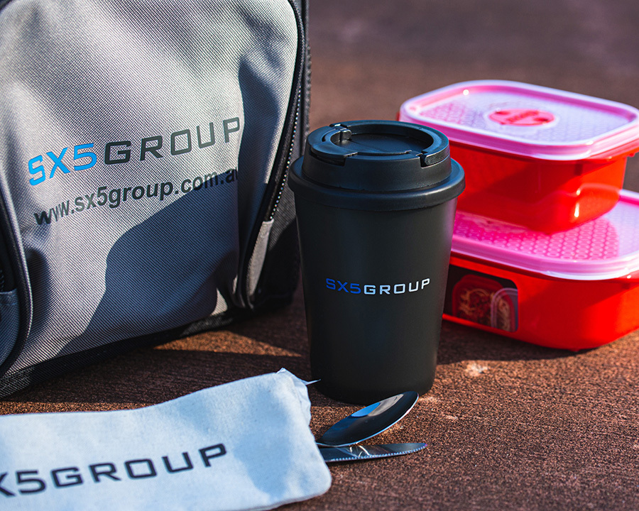 A close-up of a 9x5 group branded merchandise