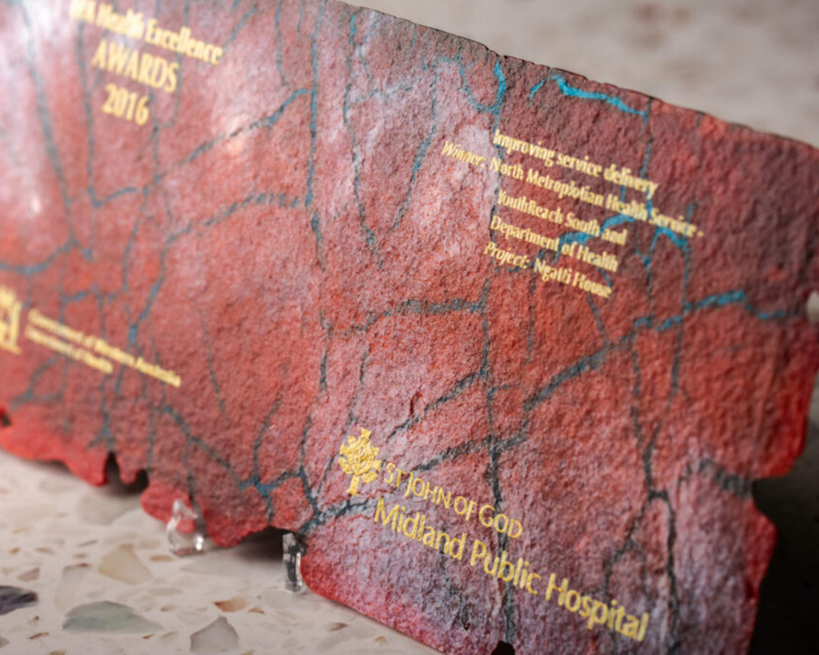 Close-up of a stone-cut award