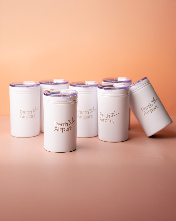 A row of perth airport branded tumblers