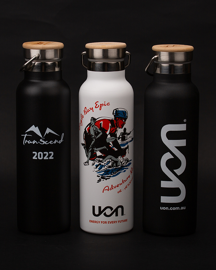 Three uon branded water bottles