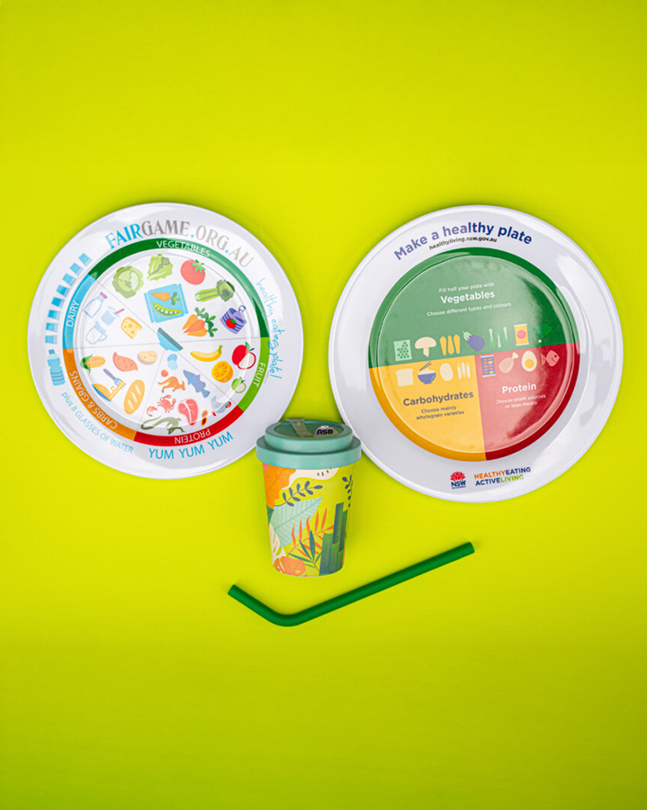 Plates with health infographics arranged to make a face