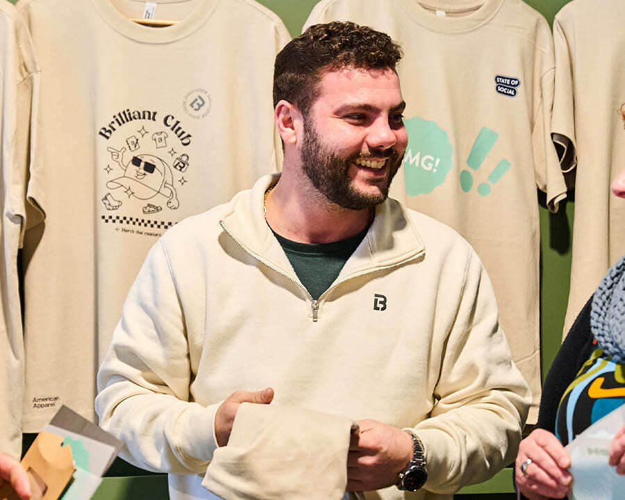 A smiling Look Brilliant empoyee at State of Social
