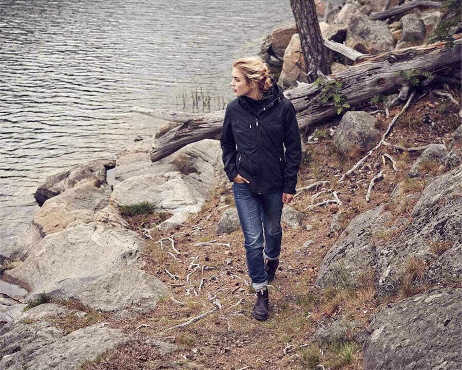 A woman in the wilderness wearing a James Harvest coventry jacket
