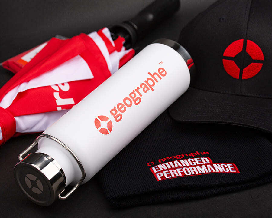 Close-up of Geographe branded bottle and hat