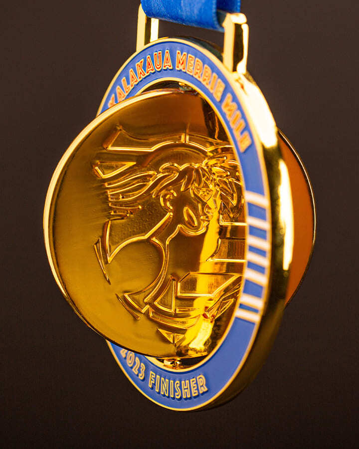 The reverse side gold side of a sports award medal