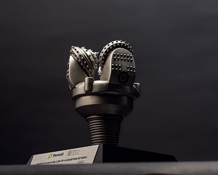 A custom metal award designed for Perenti