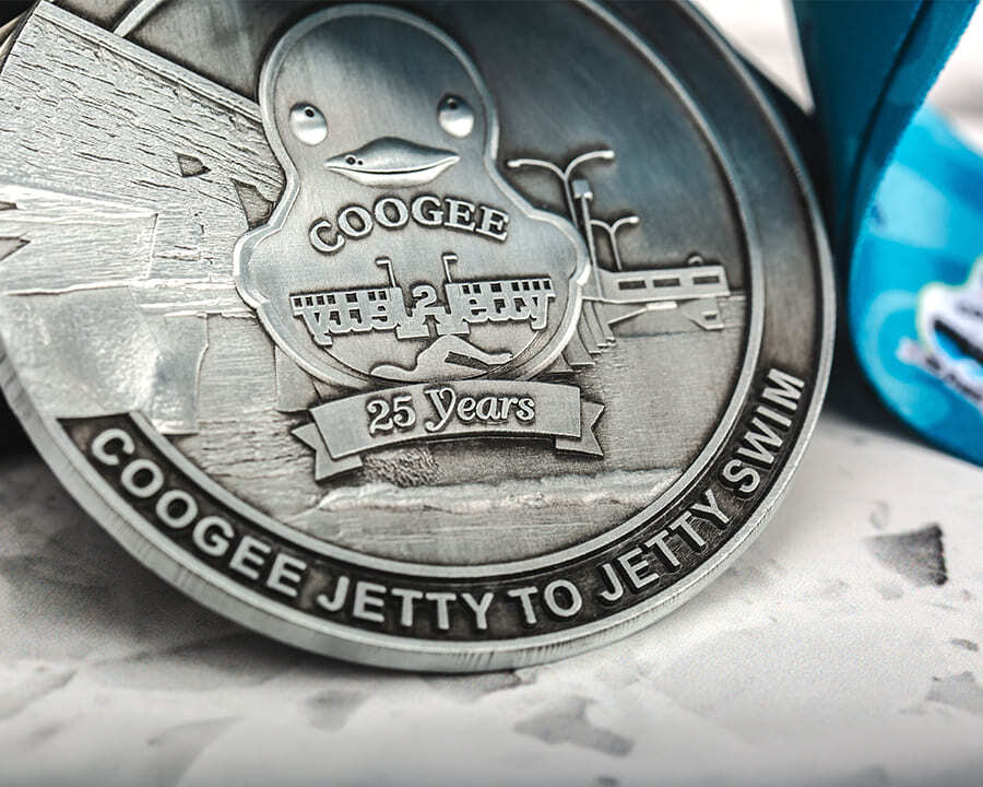 Close-up of a Coogee jetty to jety swim medal