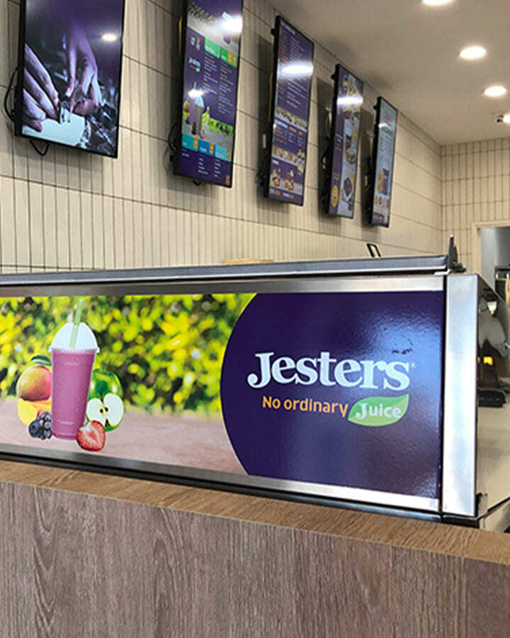 A Jesters branded point of sale sign
