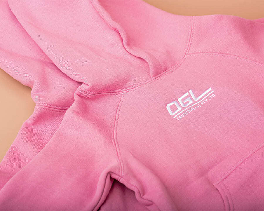 Close-up of a pink hoodie lying flat