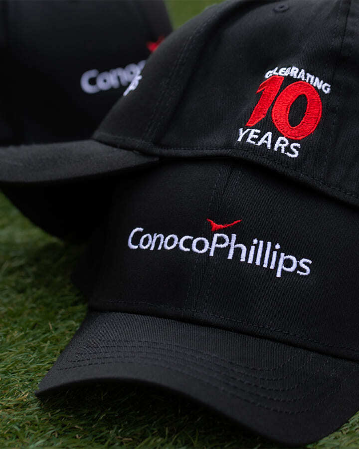 Stack of Conoco Phillips branded hats