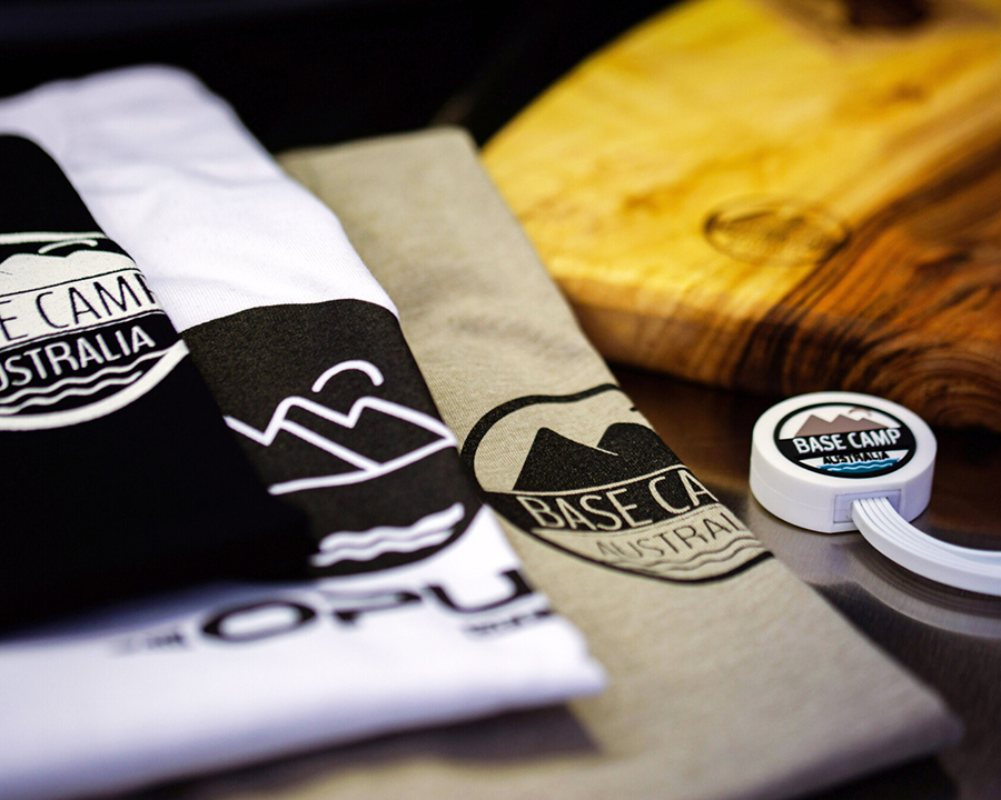 A close-up of base camp australia t-shirts