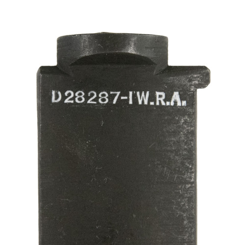 Closeup photo of the Winchester M1 Garand Bolt. Shows the manufacturers mark on the bolt. D28287-1 W.R.A is the marking.