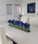 48" Casa Moderna glass plate planter with blue tulips