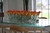 36" Casa Moderna glass plate planter with mango callas