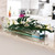 36" Casa Moderna Glass Plate Planter with white callas and monstera leaves