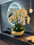 White Phalaenopsis  Orchids in  Gold Open Hands Sculpture Vase