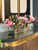 Casa Moderna Glass Planter with Bright Pink Magnolias and Driftwood