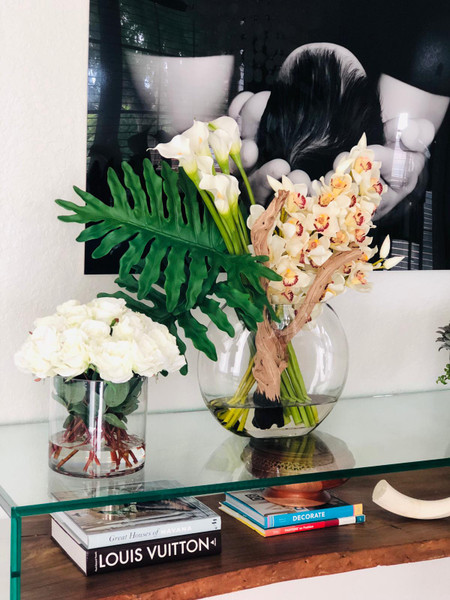 Moon vase with cymbidiums and callas