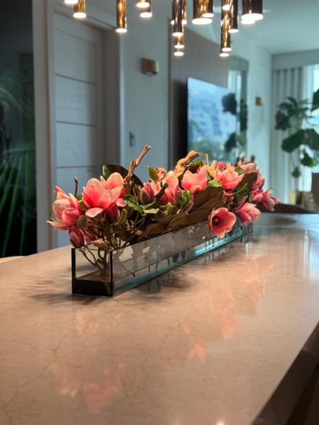 Casa Moderna Glass Planter with Bright Pink Magnolias and Driftwood