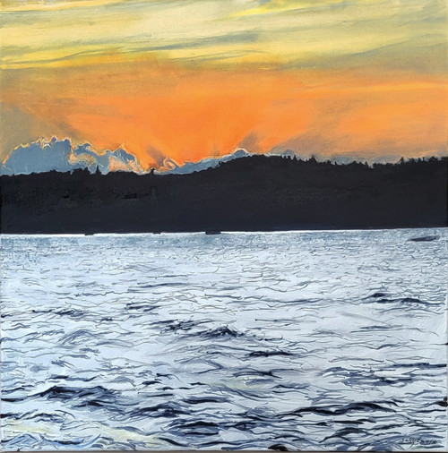 Square oil painting of a fiery orange sunset sky behind a dark mountain ridge reflecting on choppy blue lake water by Sally Bourdon.