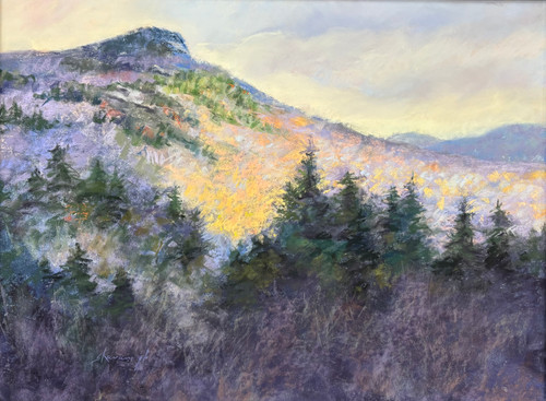 "Greens Cliff" original 24x18 vertical landscape pastel painting by Sandra Kavanaugh showing a rocky mountain slope glowing in bright gold sunlight behind dark evergreen trees