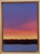 Small vertical oil painting of a purple, pink, and yellow sunset sky over a dark pine forest silhouette and blue snow by Grace Cooper.
