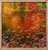 Large square impressionist oil painting on a metallic aluminum panel of orange and gold autumn trees reflecting in a pond covered in leaves by Gayle Bowen