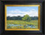 "Original 6x8 horizontal oil on canvas landscape painting titled Marsh View by Jeanne Pierce, depicting a bright golden New England marsh field with standing water pools under a soft sky."