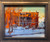Impressionist oil painting of a bright orange brick building in winter snow by Vincent Crotty.