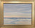 "Tonalist oil painting of a calm beach channel at sunrise with peach and periwinkle blue sky reflections by Laurie Weston.
