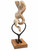 Vertical multi-angle views of the contemporary mixed media sculpture 'On the Tip of My Tong' featuring a translucent white alabaster stone ribbon gripped in antique iron ice tongs on a zebrawood base by Rebecca Robinson