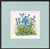 Square watercolor painting of a whimsical blue-striped creature with long legs and an orange beak standing among tall purple iris flowers by Mike Driscoll
