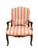 Vintage Italian Rococo Revival walnut fauteuil armchair upholstered in a red and gold striped fabric with a matching lumbar pillow on an isolated white background