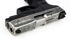 Custom engraved and Cerakoted Taurus G2C 9mm compact pistol with Fragout scrollwork