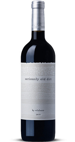 Vilafonte Seriously Old Dirt 2021 bottle from the Western Cape of South Africa, showcasing deep ruby color with black raspberry, plum, and fragrant tobacco leaf aromas.