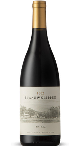 Bottle of Blaauwklippen Shiraz 2020 wine with dark fruit and pepper notes.