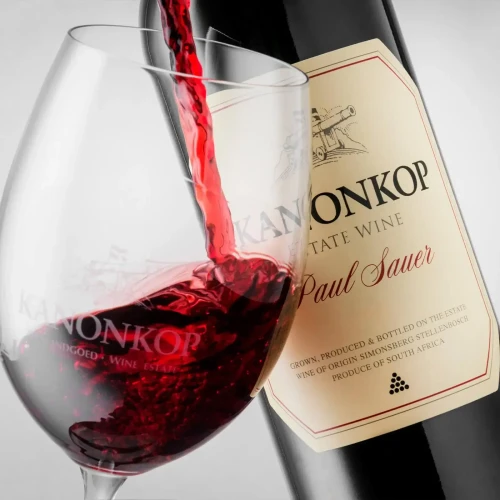 Kanonkop Paul Sauer 2022 Stellenbosch premium South African Bordeaux-style red blend being poured