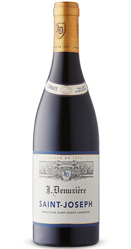 A bottle of J. Denuzière 'Saint-Joseph' Syrah, Northern Rhône 2018 red wine with notes of cassis, blackberry and earth.