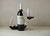 Bottle of Uva Mira 'O.T.V.' Red Blend, Stellenbosch 2017 wine with dark fruit and spice. Bottle of wine next to glass of red wine and decanter.