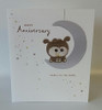 Cute Couple sitting on the moon Anniversary Card