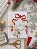 Sweet Mistletoe and Ribbon Christmas craft cutting dies with two mistletoe branches and large flowing bow for card making