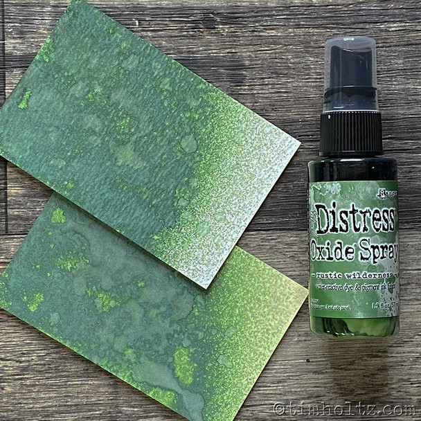 Rustic Wilderness Distress Oxide Spray ink - Tim Holtz. Tim Holtz Distress¬¨√Ü Oxide¬¨√Ü Spray is a dye and pigment ink fusion that creates oxidized effects when sprayed with water. Use for quick and easy ink coverage on porous surfaces. Spray through stencils, layer colors, spritz with water and watch the color mix and blend.

2oz bottle