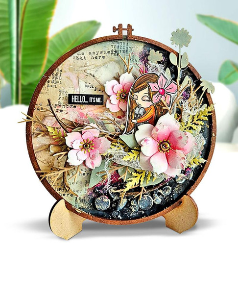 MDF Mixed Media Big Bundle, a collection of approximately 57 craft pieces including embroidery hoops, easels, chipboard, MDF boards, lattice chipboard packs, chipboard, and bookmarks, displayed on a decorative round stand with floral embellishments.