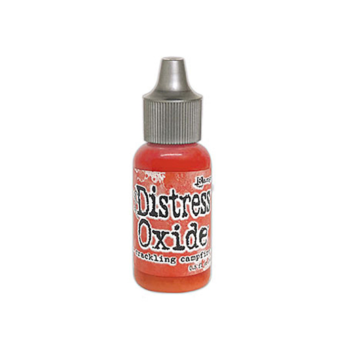 Crackling Campfire Distress Reinker - Tim Holtz. Re-Inkers can be used to re-ink Distress Ink Pads, which are sold separately. Is your inkpad going dry? Simply drip new ink onto the pad to reinvigorate it again. Eco friendly.
You can also use reinkers to colour - just use a paintbrush with the ink! 
Re-Inkers are available in 0.5oz amber glass bottle with an eye drop applicator Acid Free Non-Toxic Fade Resistant