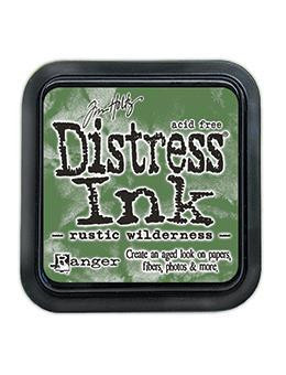Rustic Wilderness Distress Inks are a collection of water based, fade resistant, dye inks formulated to create aged vintage effects on papers and other porous surfaces.
The innovative properties of Distress Ink are unlike any other inks since they react with water and maintain color integrity.
Available in a  3" x 3" raised felt ink pad.